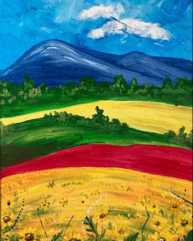 Sunflower field with mountains